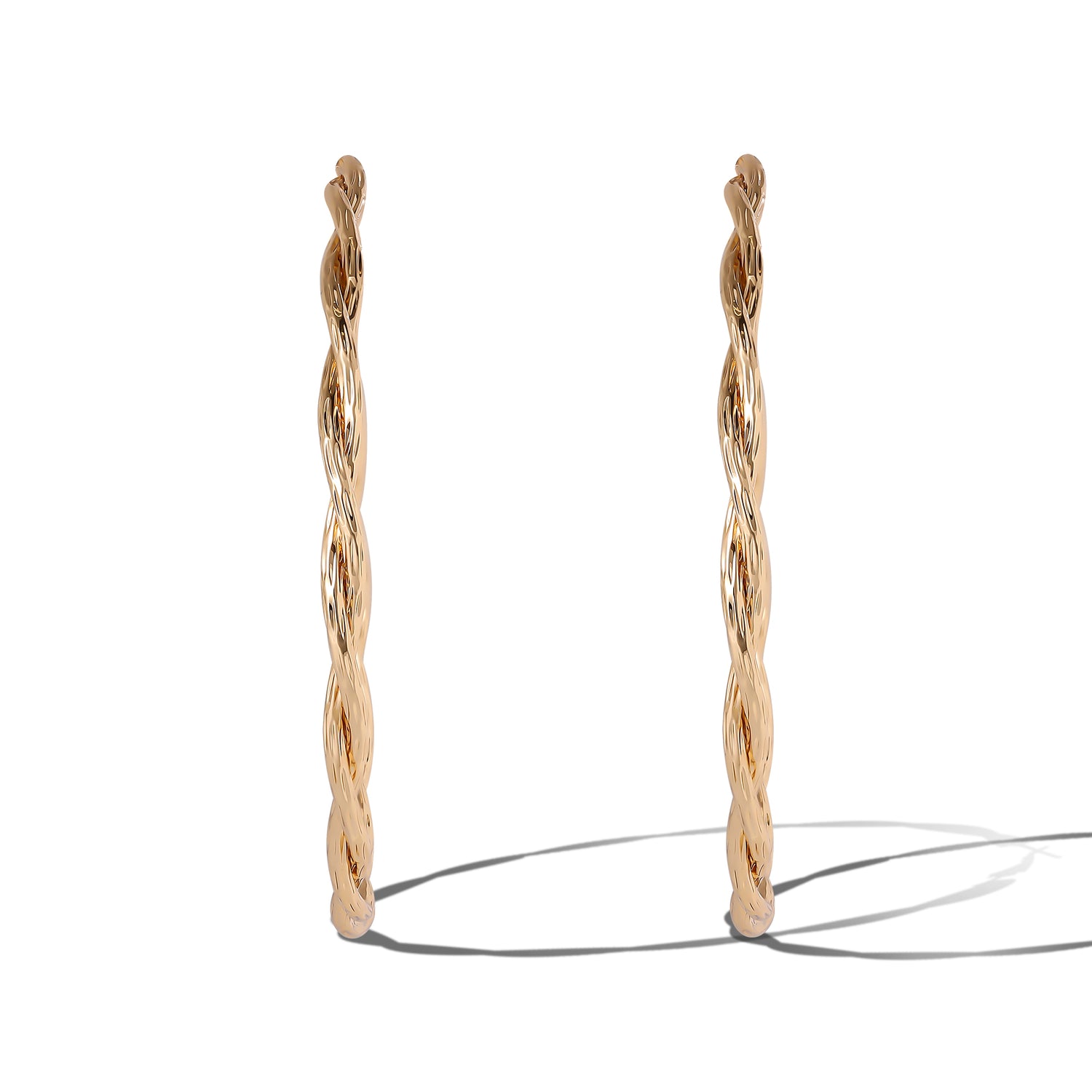 JS Jessica Simpson Gold Tone Twisted Hoop Earrings