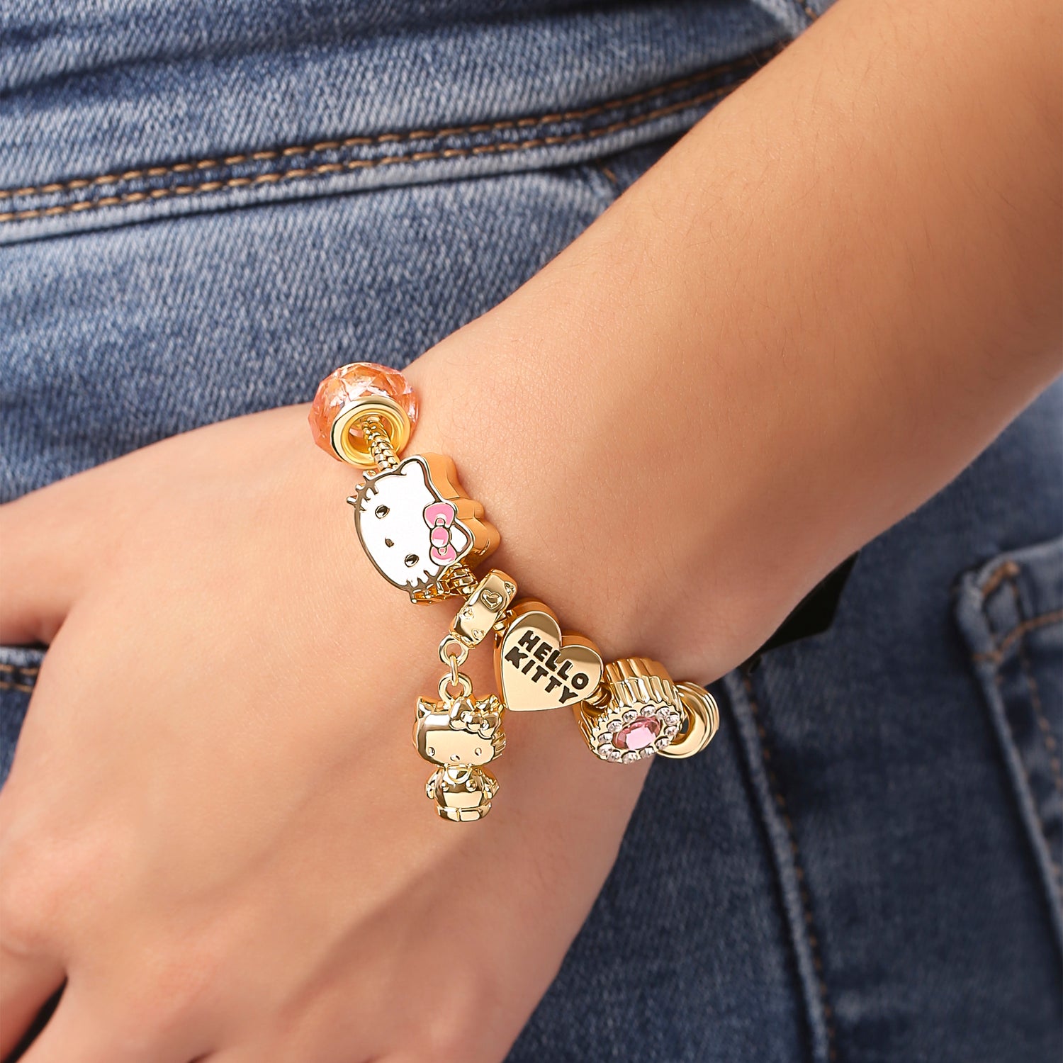 SALLY ROSE Hello Kitty Charm Bracelet for Women, 7" Gold-Tone Sanrio Bracelets with 6 Unique Charms Official License