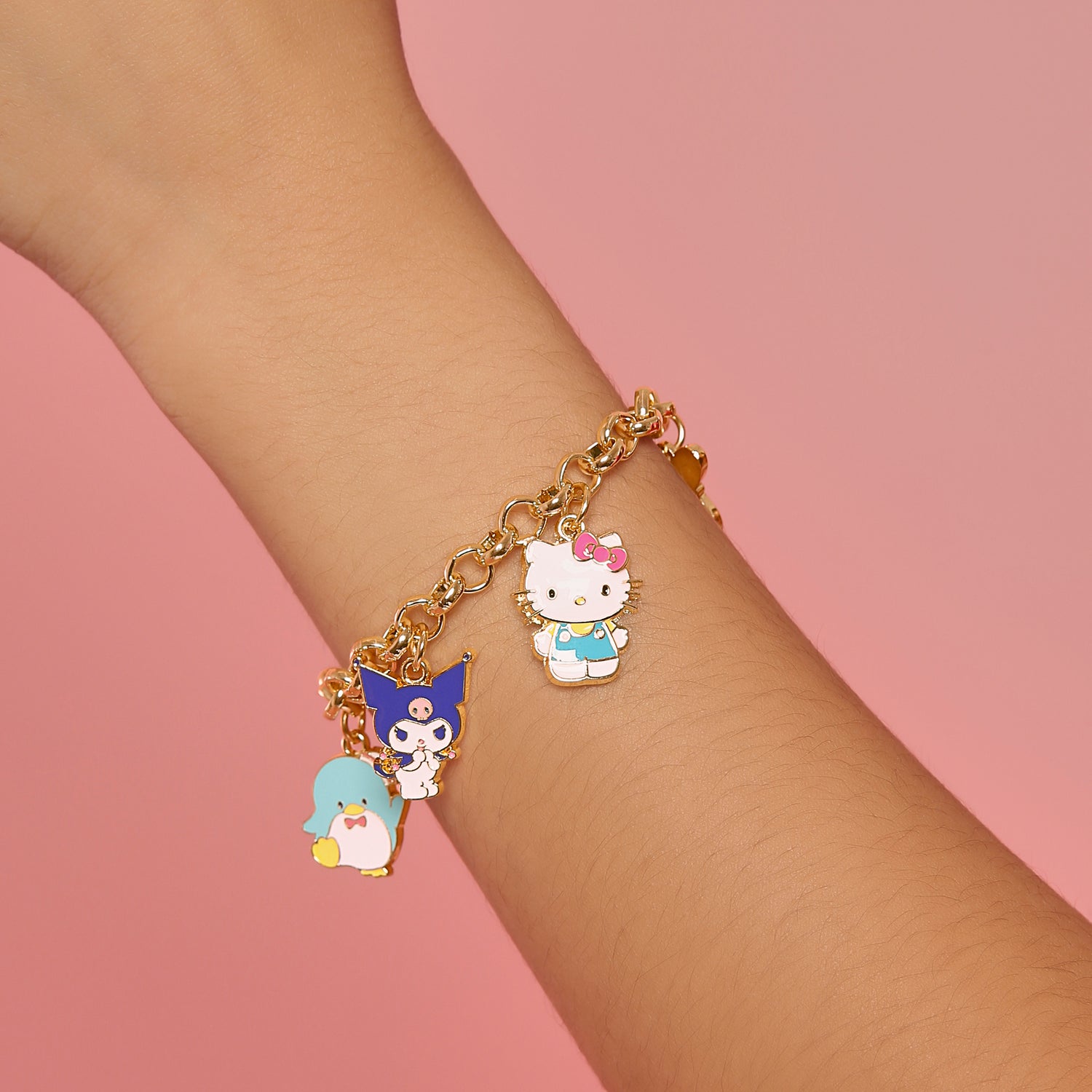 SALLY ROSE Hello Kitty and Friends Charm Bracelet for Women Official License, 7"+1" Gold-Tone Fashion Bracelet with Sanrio Charms