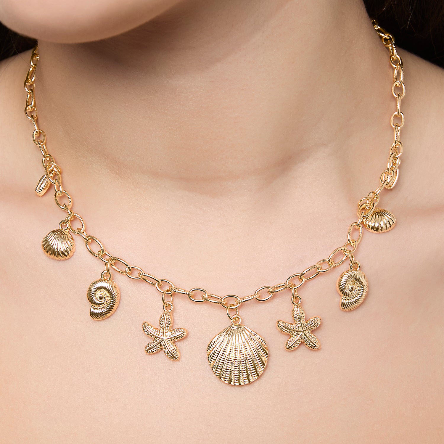 Jessica Simpson Ocean Charms Necklace for Women, 16"+3" Gold-Tone Chunky Necklace with 9 Charms