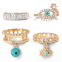 Jessica Simpson 4-Piece Charm Ring Set with Turquoise Accents - Size 7