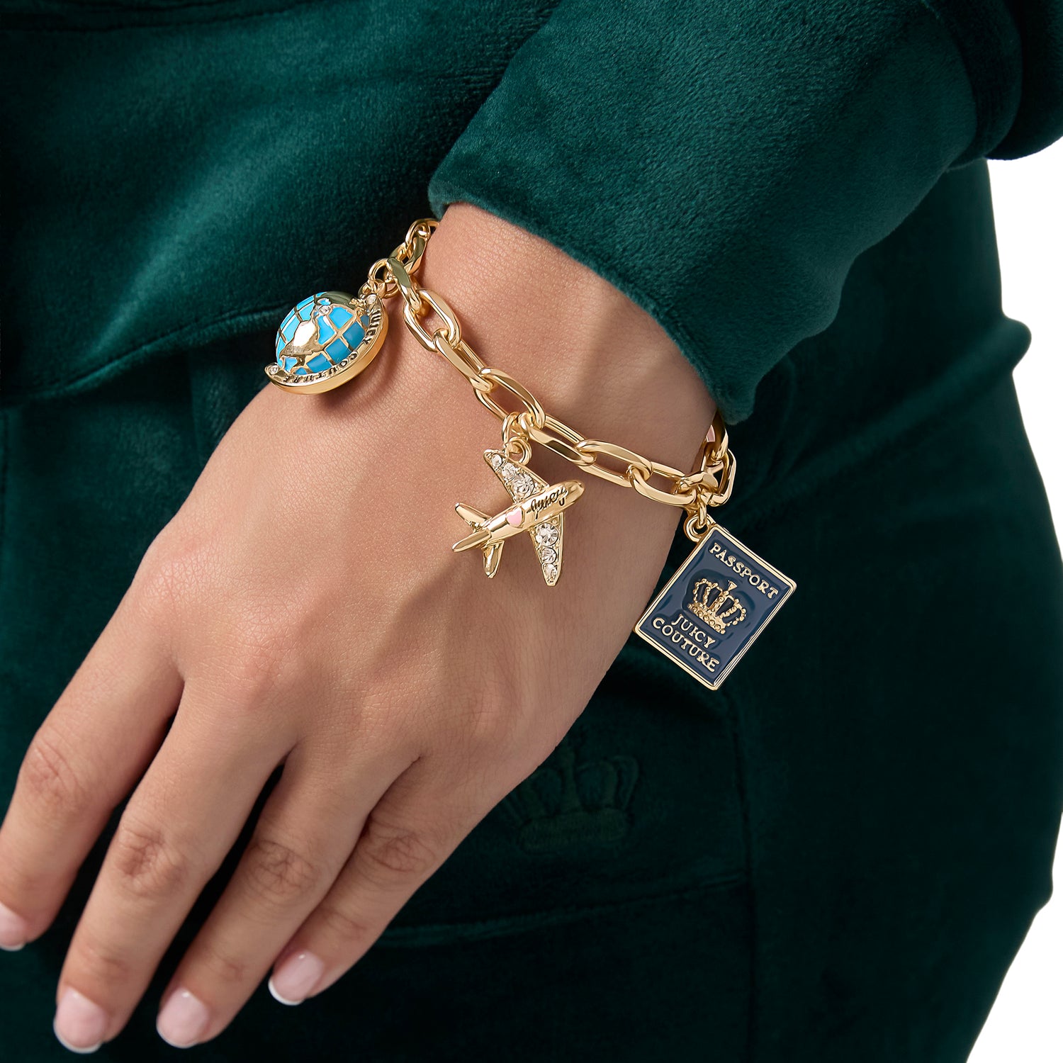 Juicy Couture Travel Icons Charm Bracelet, Gold‑Tone with Blue & Pink Enamel
