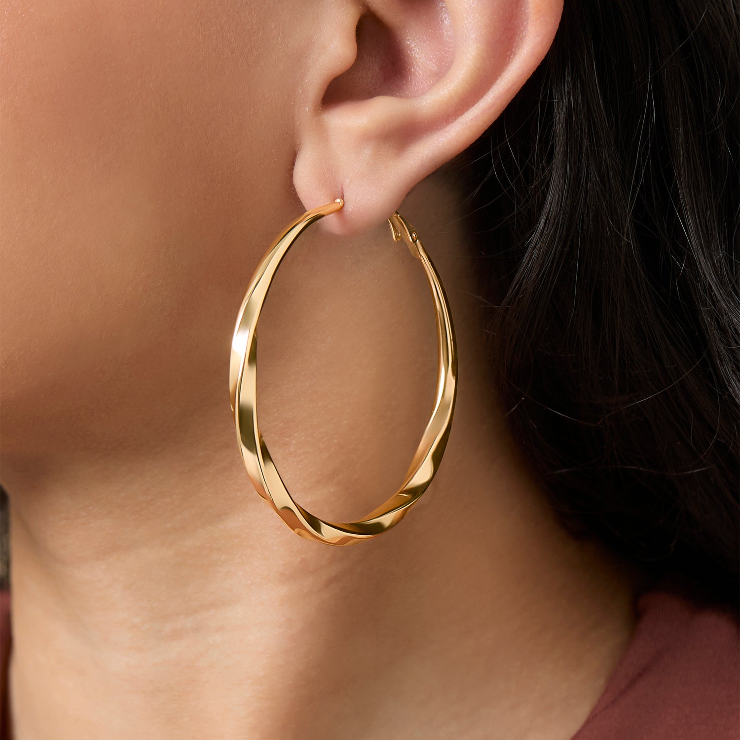 JS Jessica Simpson Twisted Gold Tone Hoop Earrings