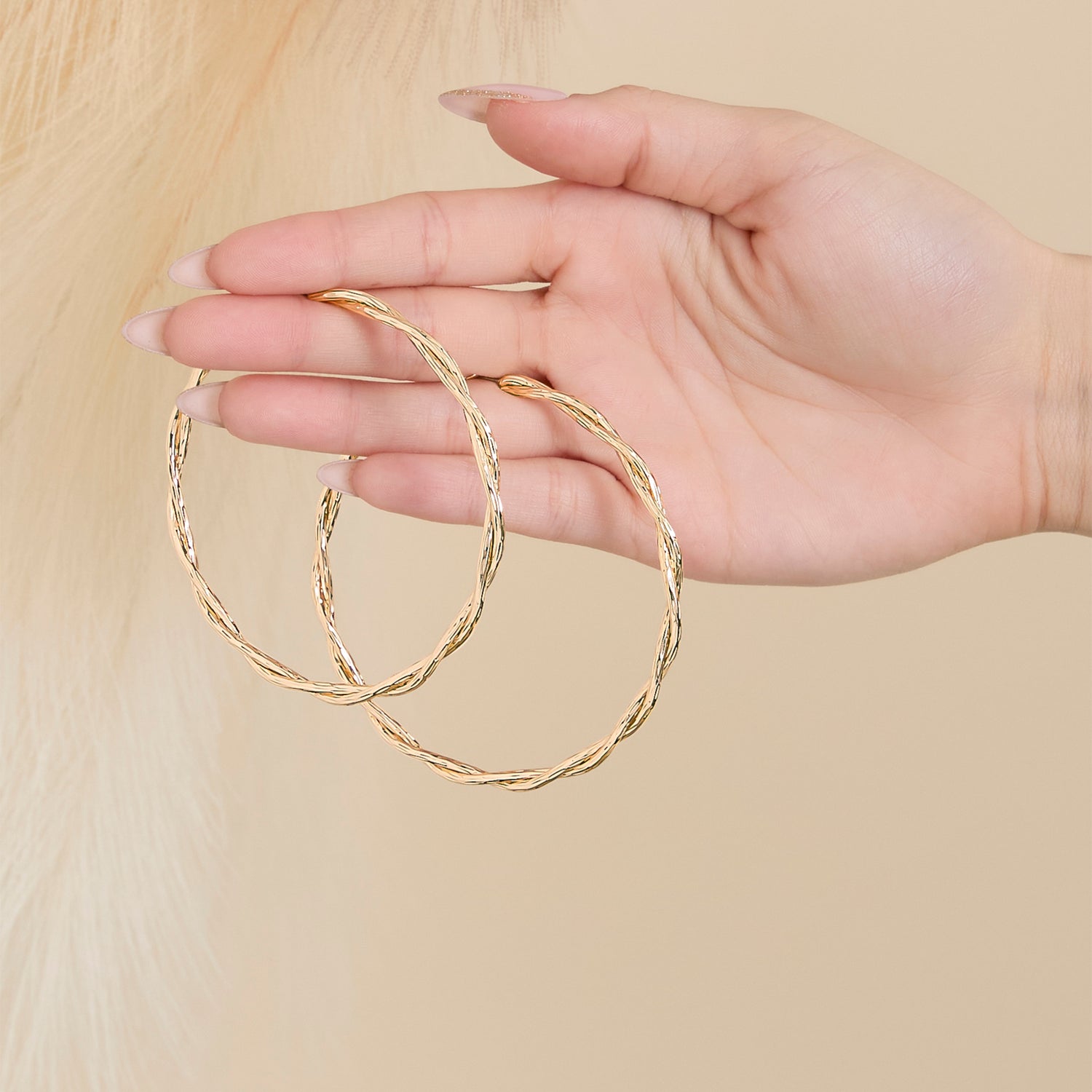 JS Jessica Simpson Gold Tone Twisted Hoop Earrings