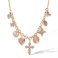 JS Jessica Simpson Gold Tone Textured Cross Heart Charm Necklace