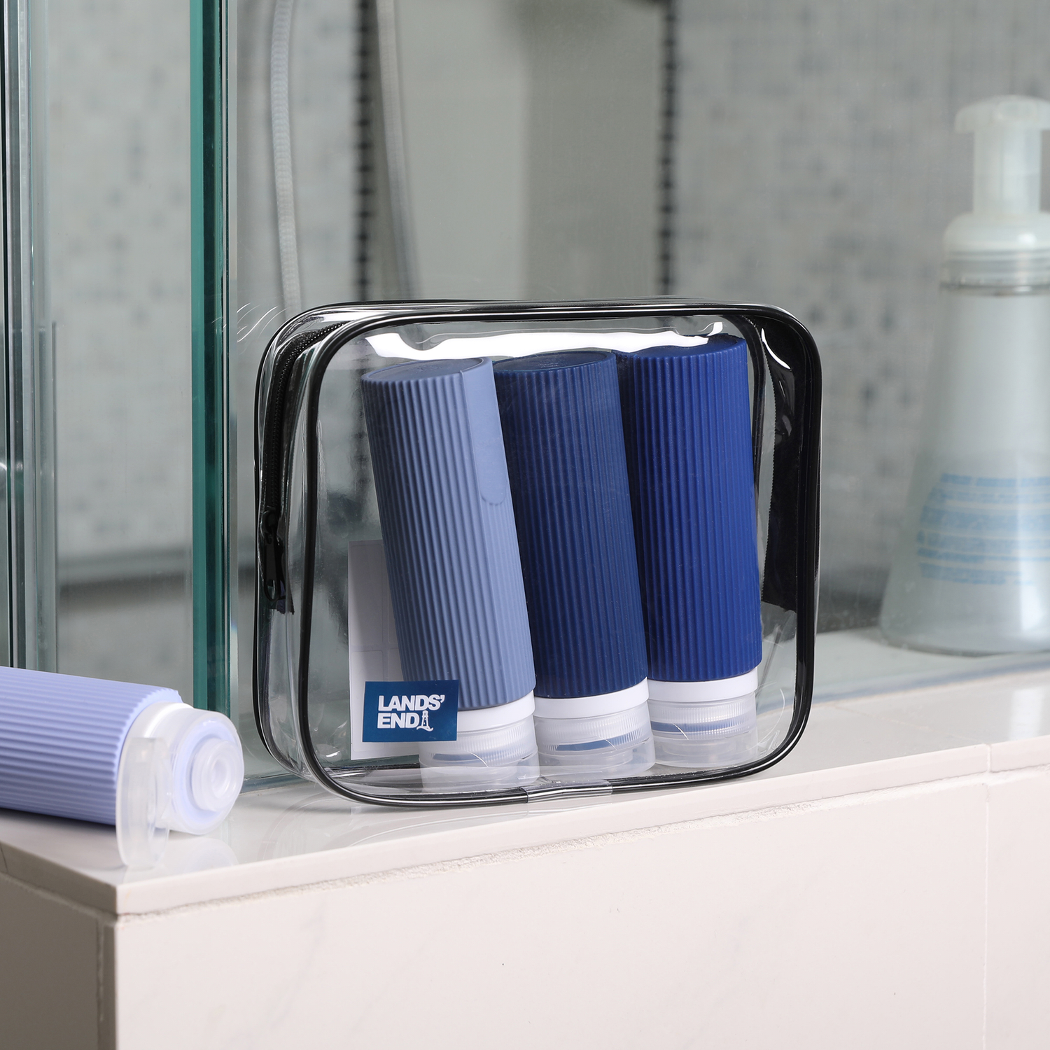 Lands' End Travel Bottle Set 3-Piece, 90 ML Travel Size Silicone Travel Bottles with Clear Container Bag  (Navy Multicolor)