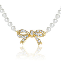 Juicy Couture Pearl Necklace with Pavé Bow, Gold‑Tone Accents